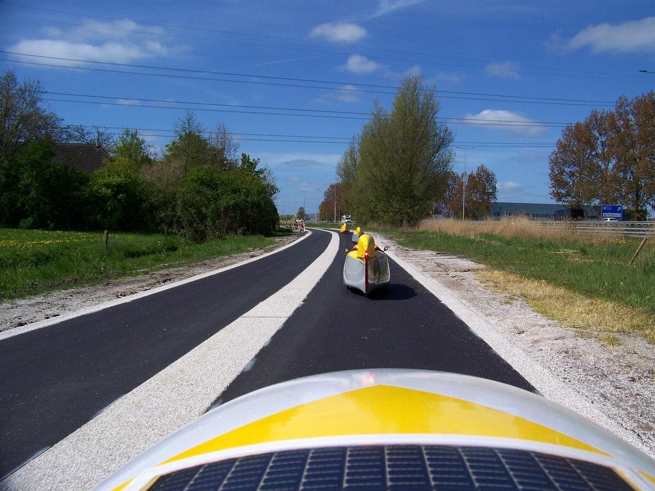 Velomobiles riding along a new fietssnelweg